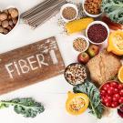 A group of fiber food items, including bread, fruits, vegetables and more